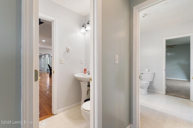 622 Hillcreek Dr, Elizabethtown, KY 42701 - bathroom with toilet, tile patterned floors, and baseboards
