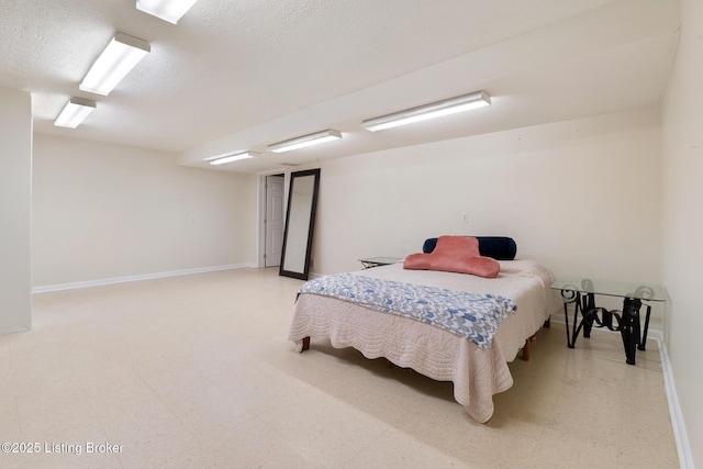 622 Hillcreek Dr, Elizabethtown, KY 42701 - bedroom with baseboards, a textured ceiling, and light flooring