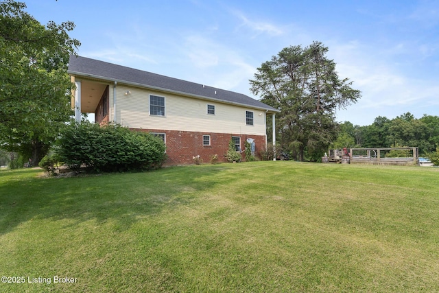 622 Hillcreek Dr, Elizabethtown, KY 42701 - back of property with a lawn and brick siding