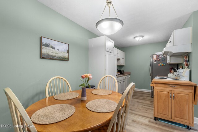 165 Central Blvd Apt 51, Mt Washington, KY 40047 - dining room featuring light wood finished floors and baseboards