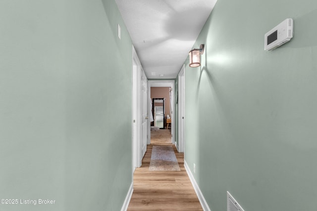 165 Central Blvd Apt 51, Mt Washington, KY 40047 - hall featuring light wood-type flooring and baseboards