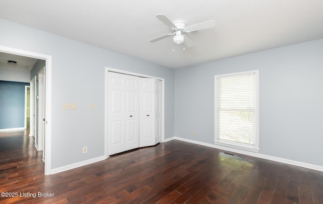 211 Rebel Dr, Pewee Valley, KY 40056 - unfurnished bedroom with baseboards, dark wood-type flooring, a closet, and attic access