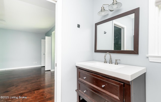 211 Rebel Dr, Pewee Valley, KY 40056 - bathroom featuring wood finished floors, vanity, and baseboards