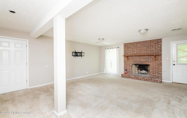 211 Rebel Dr, Pewee Valley, KY 40056 - unfurnished living room with a textured ceiling, carpet, a brick fireplace, and baseboards