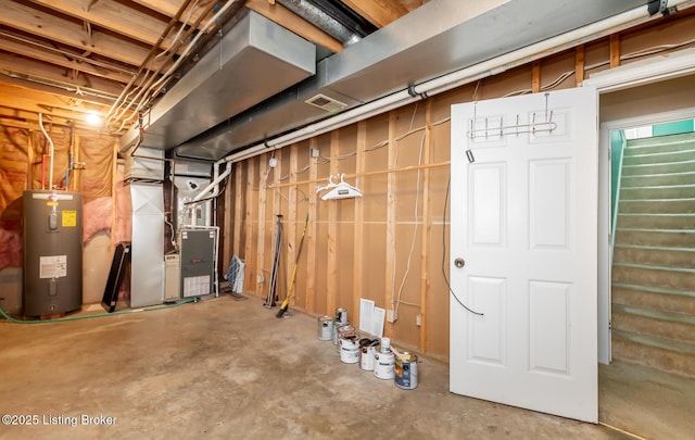 211 Rebel Dr, Pewee Valley, KY 40056 - unfinished below grade area with water heater, heating unit, and stairs
