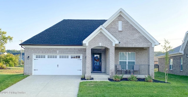 1325 Helm Place Ln, Louisville, KY 40299 - view of front of house featuring a porch, a front yard, driveway, an attached garage, and a shingled roof