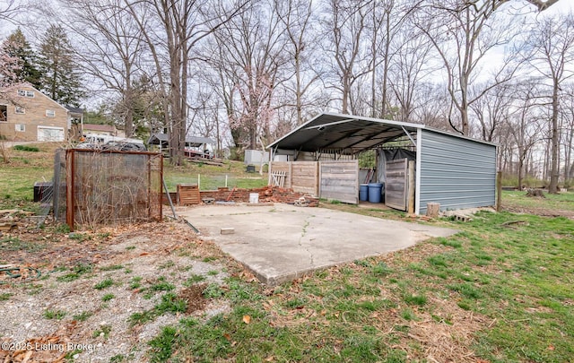 4825 Manslick Rd, Louisville, KY 40216 - view of yard featuring a detached carport