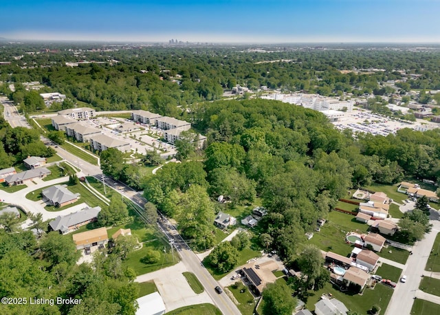 4825 Manslick Rd, Louisville, KY 40216 - aerial view of property's location with a heavily wooded area