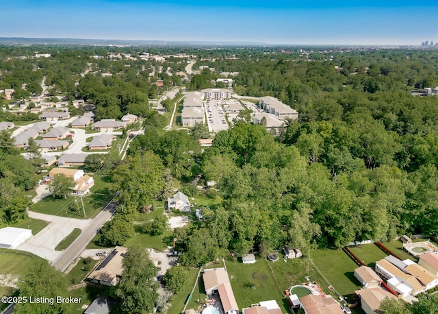 4825 Manslick Rd, Louisville, KY 40216 - aerial view of property and surrounding area featuring a forest