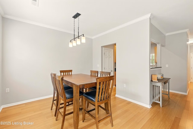 4926 Merton Sq, Louisville, KY 40241 - dining space with light wood-type flooring, crown molding, and baseboards
