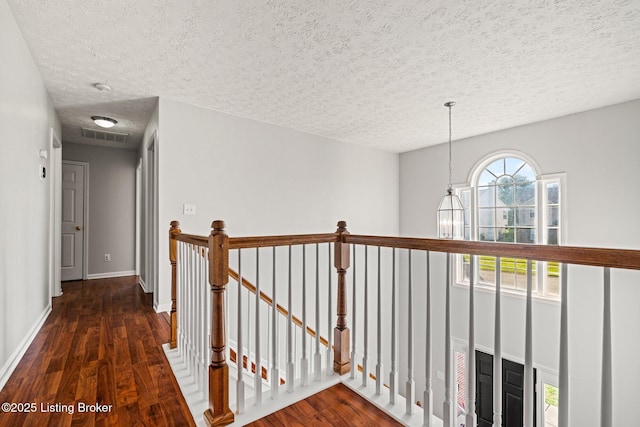 5500 Worthington Place Dr, Louisville, KY 40241 - hallway featuring an upstairs landing, a textured ceiling, wood finished floors, and baseboards