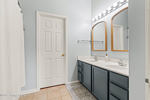 5500 Worthington Place Dr, Louisville, KY 40241 - full bath featuring double vanity, baseboards, and tile patterned floors