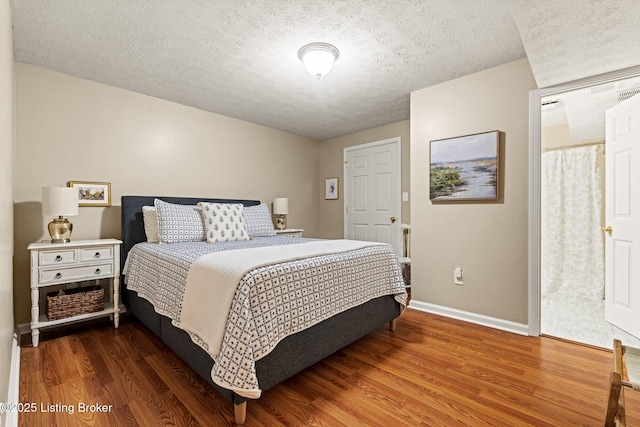 5500 Worthington Place Dr, Louisville, KY 40241 - bedroom featuring wood finished floors, baseboards, and a textured ceiling