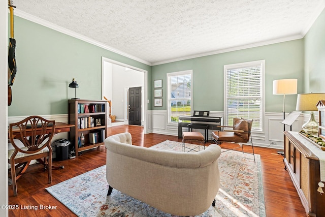 5500 Worthington Place Dr, Louisville, KY 40241 - living area with a textured ceiling, crown molding, a wainscoted wall, and wood finished floors