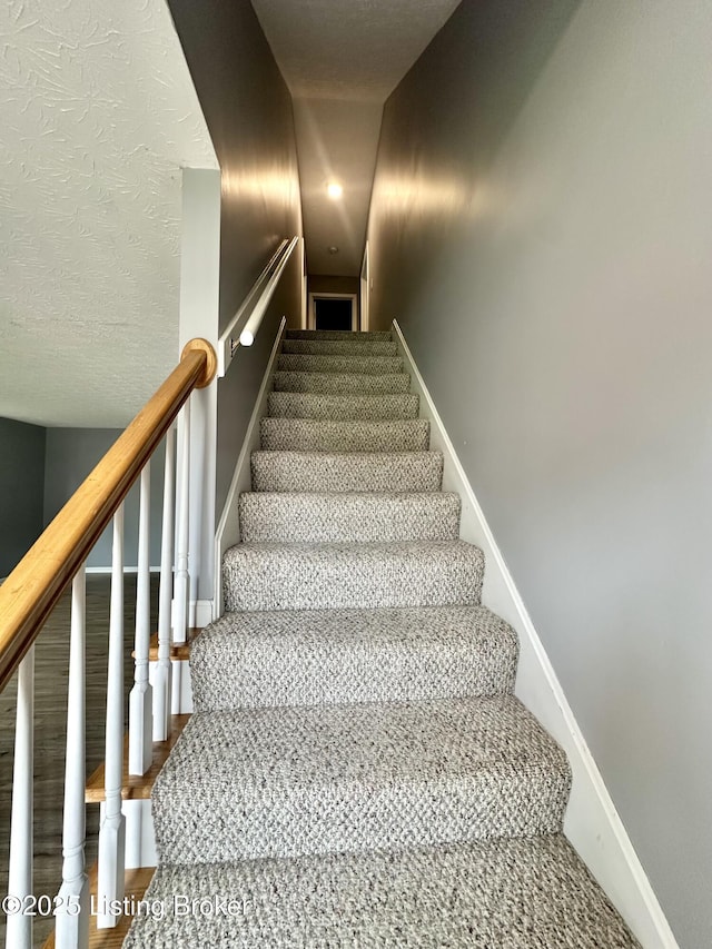 512 Auburn Oaks Dr, Louisville, KY 40214 - staircase featuring baseboards and wood finished floors