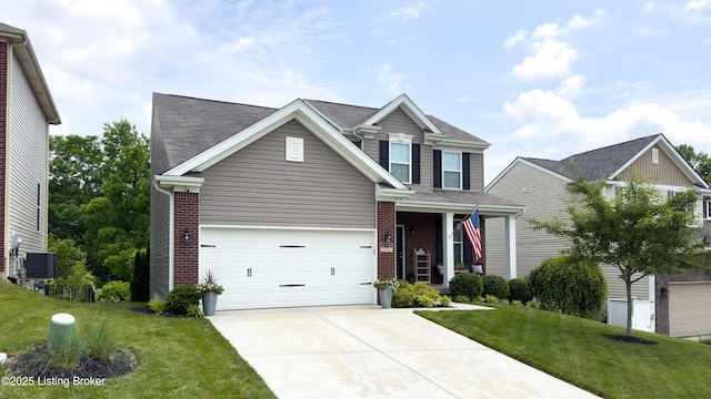 17115 Green Crest Ln, Louisville, KY 40245 - traditional-style house with concrete driveway, a front yard, brick siding, and a garage