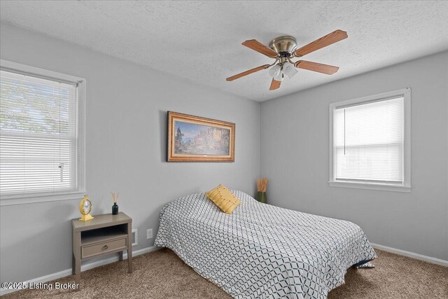 4311 Wendy Hills Dr, Crestwood, KY 40014 - carpeted bedroom with multiple windows, baseboards, a textured ceiling, and ceiling fan