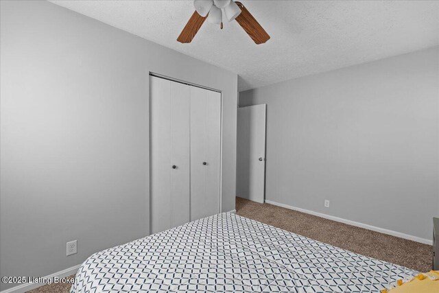 4311 Wendy Hills Dr, Crestwood, KY 40014 - carpeted bedroom with a closet, baseboards, a textured ceiling, and ceiling fan