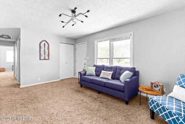 4311 Wendy Hills Dr, Crestwood, KY 40014 - carpeted living room featuring healthy amount of natural light, a textured ceiling, and baseboards
