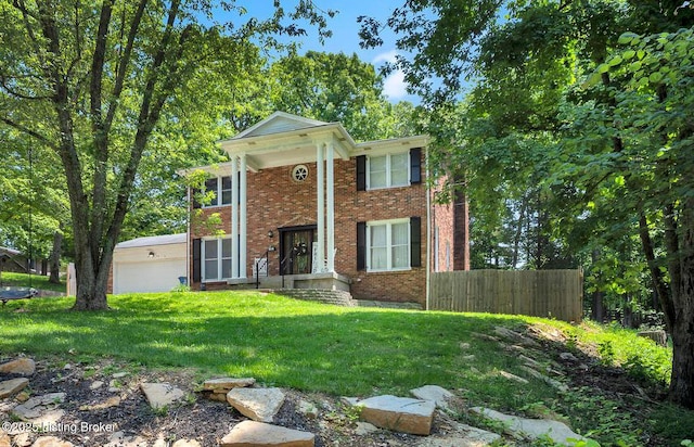 404 Bellemeade St, Brandenburg, KY 40108 - neoclassical / greek revival house featuring brick siding and a garage