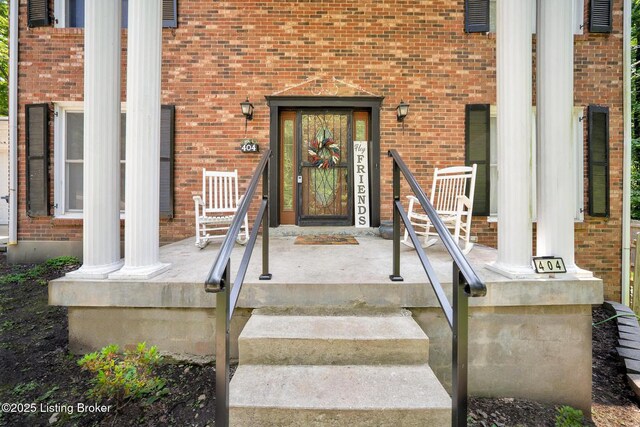 404 Bellemeade St, Brandenburg, KY 40108 - view of exterior entry featuring brick siding