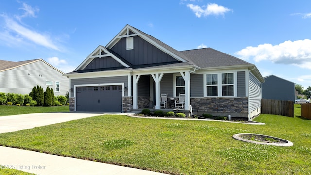 125 Bridlewood Dr, Shepherdsville, KY 40165 - craftsman-style home featuring covered porch, board and batten siding, driveway, stone siding, and a garage