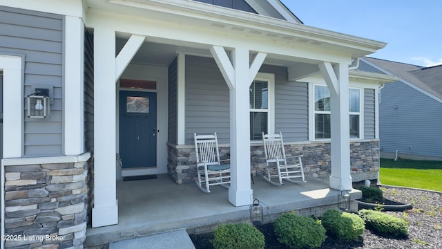 125 Bridlewood Dr, Shepherdsville, KY 40165 - property entrance with a porch and stone siding