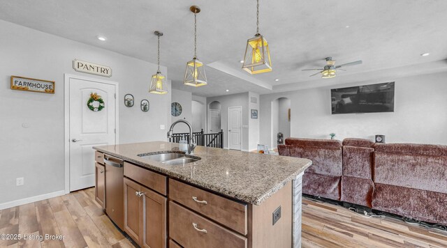 125 Bridlewood Dr, Shepherdsville, KY 40165 - kitchen with arched walkways, dishwasher, ceiling fan, light wood-type flooring, and recessed lighting
