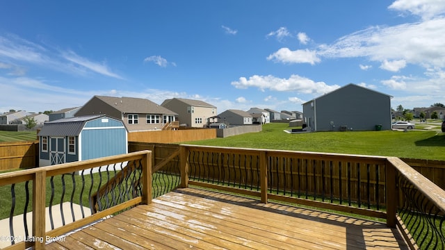 125 Bridlewood Dr, Shepherdsville, KY 40165 - wooden deck with a residential view, a storage shed, and a fenced backyard