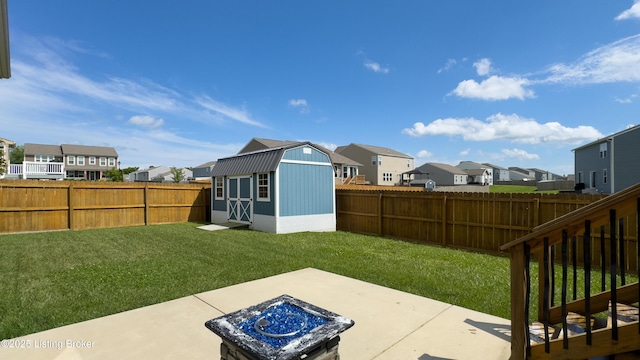 125 Bridlewood Dr, Shepherdsville, KY 40165 - fenced backyard with a residential view, a patio area, and a storage shed