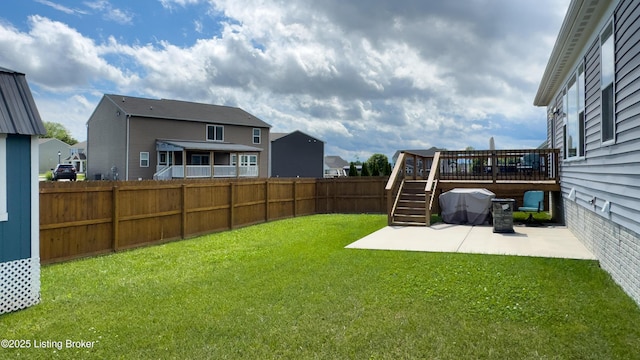 125 Bridlewood Dr, Shepherdsville, KY 40165 - fenced backyard with a patio, a wooden deck, stairs, and a residential view