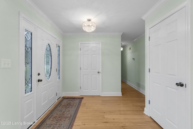 3205 Lake Pointe Ct, Crestwood, KY 40014 - foyer with light wood-type flooring, crown molding, a chandelier, and baseboards