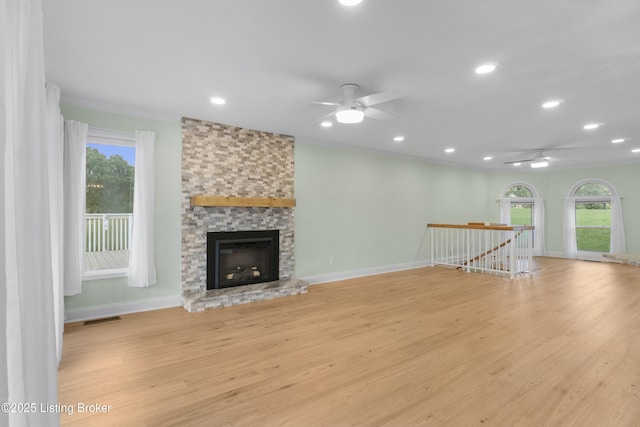 3205 Lake Pointe Ct, Crestwood, KY 40014 - unfurnished living room featuring ceiling fan, light wood-type flooring, plenty of natural light, crown molding, and recessed lighting