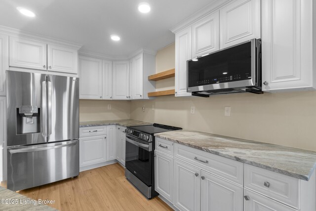 3205 Lake Pointe Ct, Crestwood, KY 40014 - kitchen featuring stainless steel appliances, white cabinetry, light wood-style floors, light stone counters, and recessed lighting