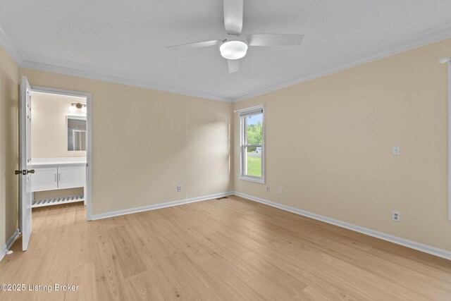 3205 Lake Pointe Ct, Crestwood, KY 40014 - spare room featuring light wood-style flooring, crown molding, a ceiling fan, and baseboards