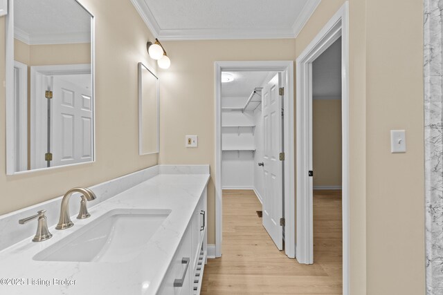 3205 Lake Pointe Ct, Crestwood, KY 40014 - bathroom with wood finished floors, vanity, and crown molding