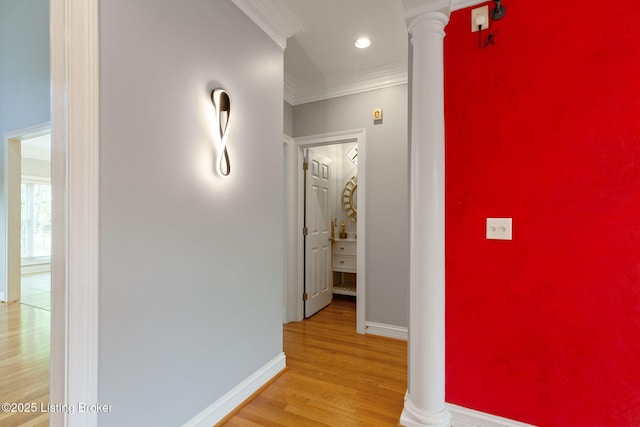 15108 Chestnut Ridge Cir, Louisville, KY 40245 - hall featuring decorative columns, light wood finished floors, baseboards, crown molding, and recessed lighting