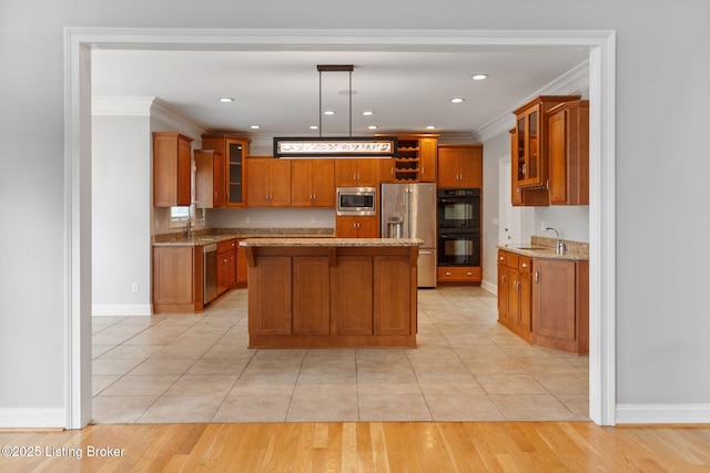 15108 Chestnut Ridge Cir, Louisville, KY 40245 - kitchen with appliances with stainless steel finishes, brown cabinets, light stone countertops, ornamental molding, and glass insert cabinets