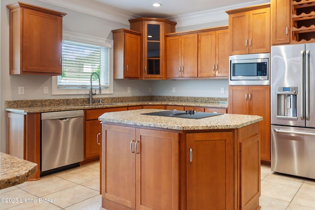 15108 Chestnut Ridge Cir, Louisville, KY 40245 - kitchen featuring stainless steel appliances, a center island, ornamental molding, brown cabinets, and light stone counters