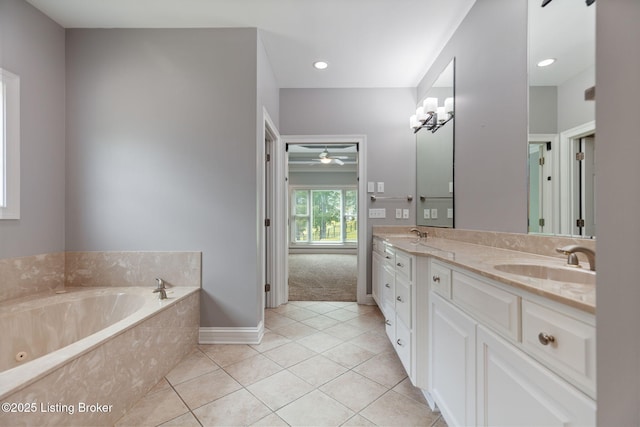 15108 Chestnut Ridge Cir, Louisville, KY 40245 - bathroom with double vanity, a tub with jets, a ceiling fan, tile patterned flooring, and baseboards