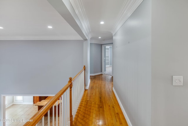 15108 Chestnut Ridge Cir, Louisville, KY 40245 - corridor with recessed lighting, ornamental molding, baseboards, an upstairs landing, and wood finished floors