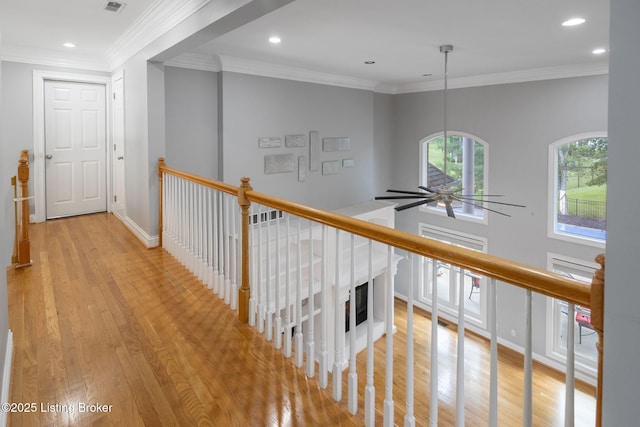 15108 Chestnut Ridge Cir, Louisville, KY 40245 - hallway with light wood-type flooring, an upstairs landing, recessed lighting, and crown molding