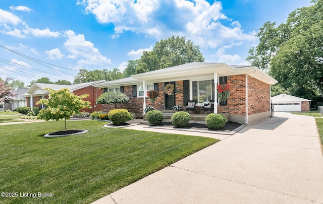 922 Fenley Ave, Louisville, KY 40222 - single story home featuring an outbuilding, brick siding, covered porch, a garage, and a front yard