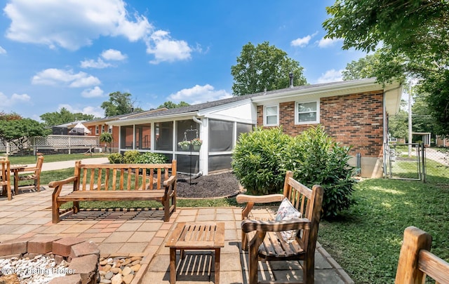 922 Fenley Ave, Louisville, KY 40222 - view of patio / terrace featuring a gate and a sunroom