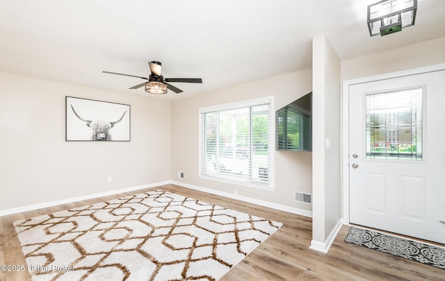 922 Fenley Ave, Louisville, KY 40222 - entrance foyer with wood finished floors, a ceiling fan, and baseboards