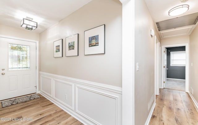 922 Fenley Ave, Louisville, KY 40222 - foyer featuring wainscoting and light wood finished floors