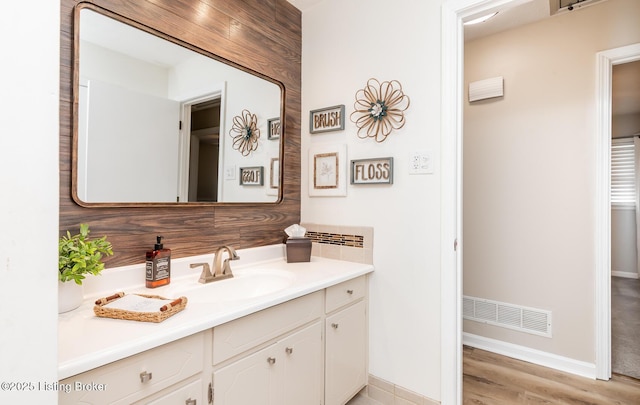 922 Fenley Ave, Louisville, KY 40222 - bathroom with vanity, baseboards, and wood finished floors