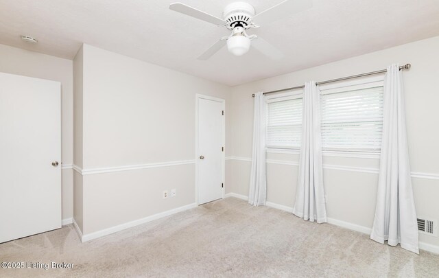 922 Fenley Ave, Louisville, KY 40222 - unfurnished bedroom featuring carpet, baseboards, and a ceiling fan