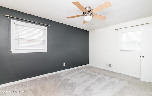 922 Fenley Ave, Louisville, KY 40222 - carpeted spare room featuring a ceiling fan, baseboards, and healthy amount of natural light