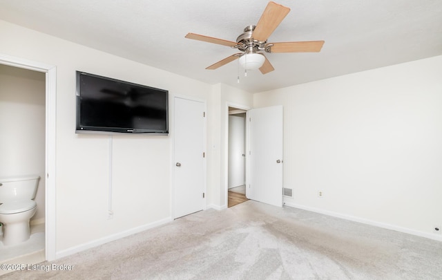 922 Fenley Ave, Louisville, KY 40222 - unfurnished bedroom featuring carpet floors, baseboards, ensuite bath, and ceiling fan